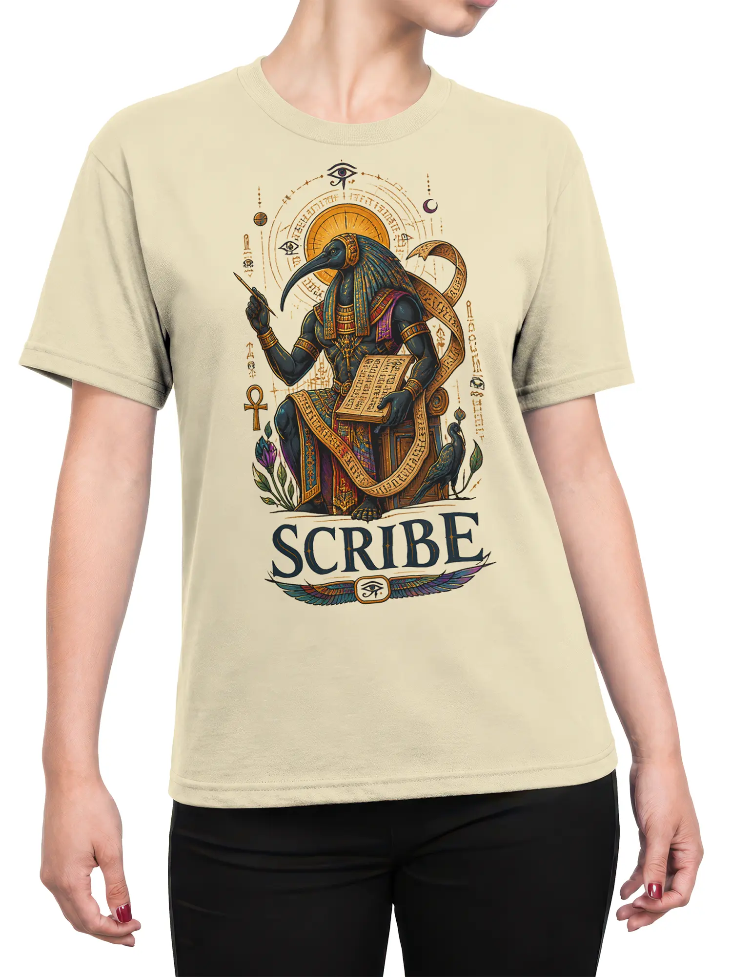 Female torso wearing a beige T-shirt with an Egyptian ibis scribe design and colorful sacred symbol details