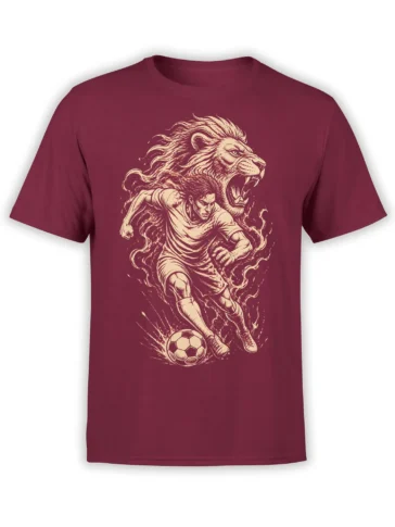 Maroon soccer T-shirt with a charging player, roaring lion, and soccer ball in cream artwork