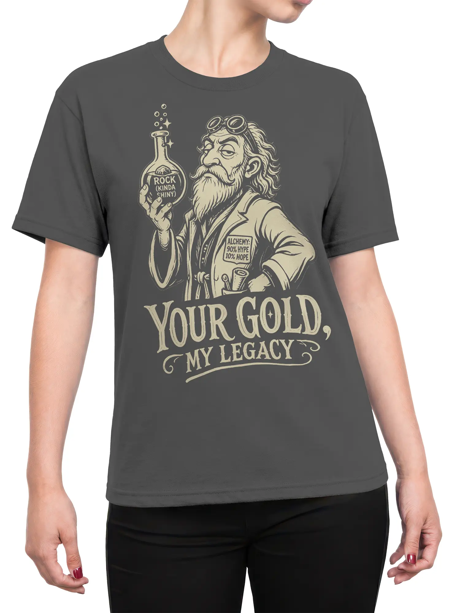 Female torso wearing a gray alchemy T-shirt with a vintage alchemist and “Your Gold, My Legacy” print