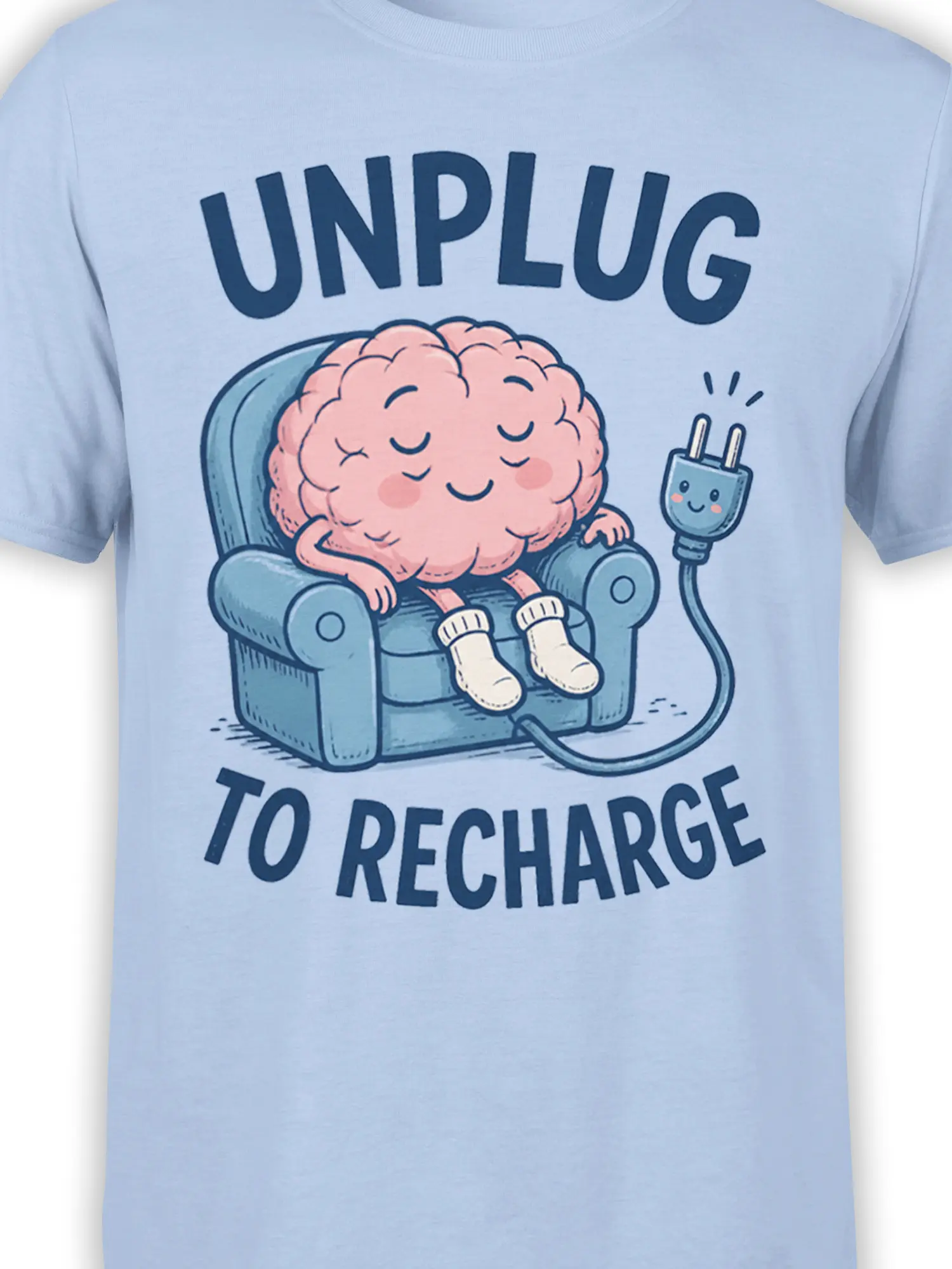 Close-up of the sleepy pink brain, armchair, plug, and UNPLUG TO RECHARGE design on a light blue shirt
