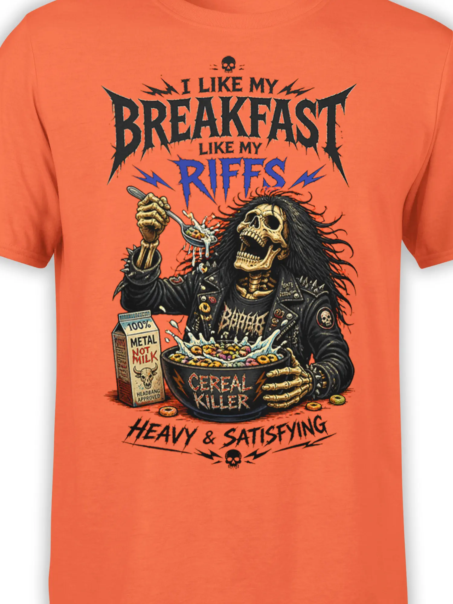 Close-up of skeleton metalhead, cereal bowl, and breakfast lettering on an orange T-shirt