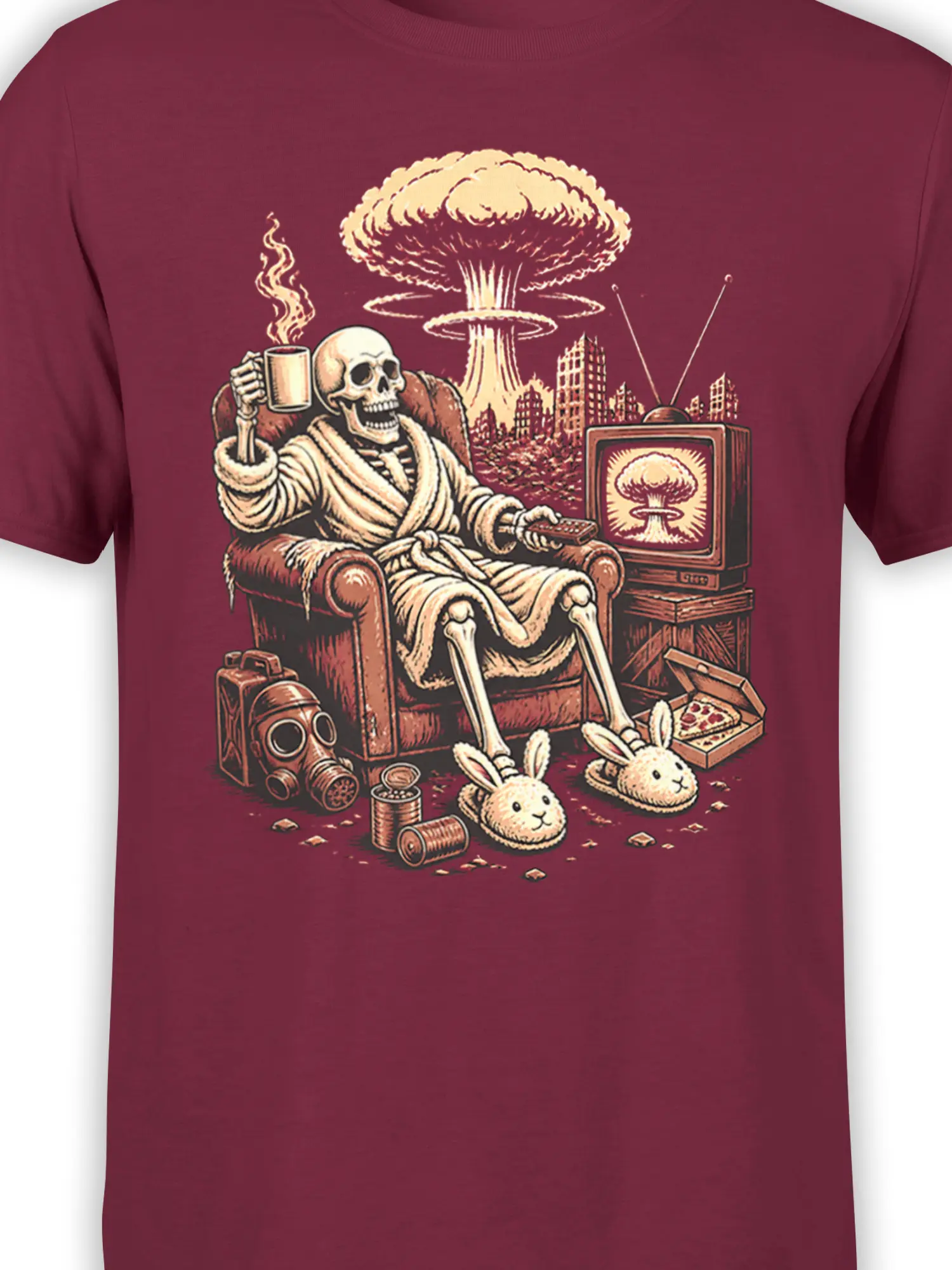 Close-up of the burgundy shirt design showing a skeleton, vintage TV, mushroom cloud, pizza, and rabbits