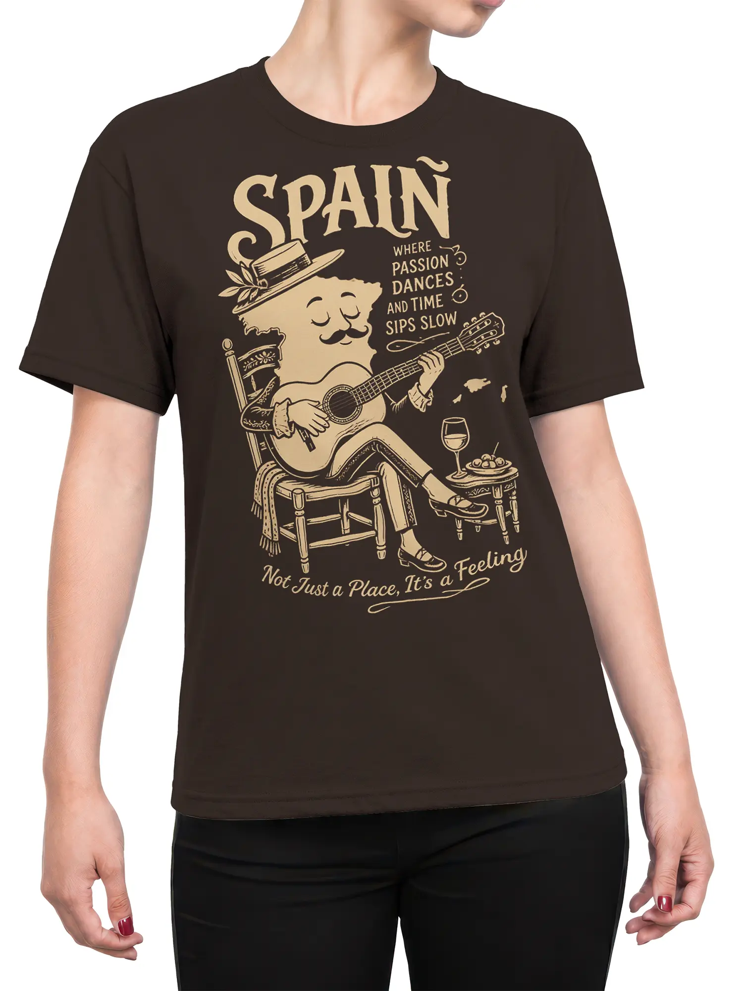 Female torso wearing a brown Spain T-shirt with vintage guitarist, wine, tapas, and cream lettering