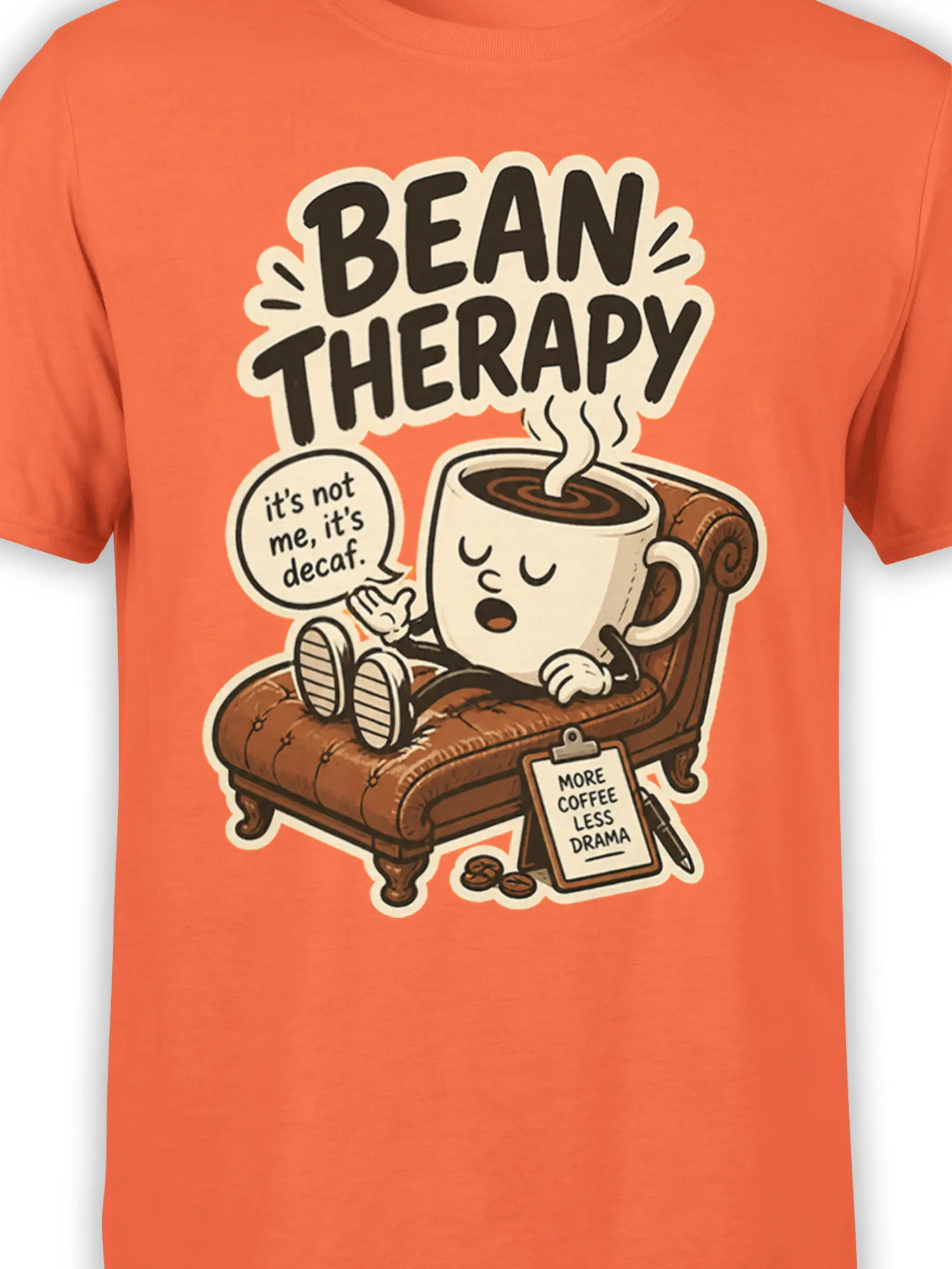 Close-up of the Bean Therapy design on an orange shirt with a sleepy coffee cup and decaf joke