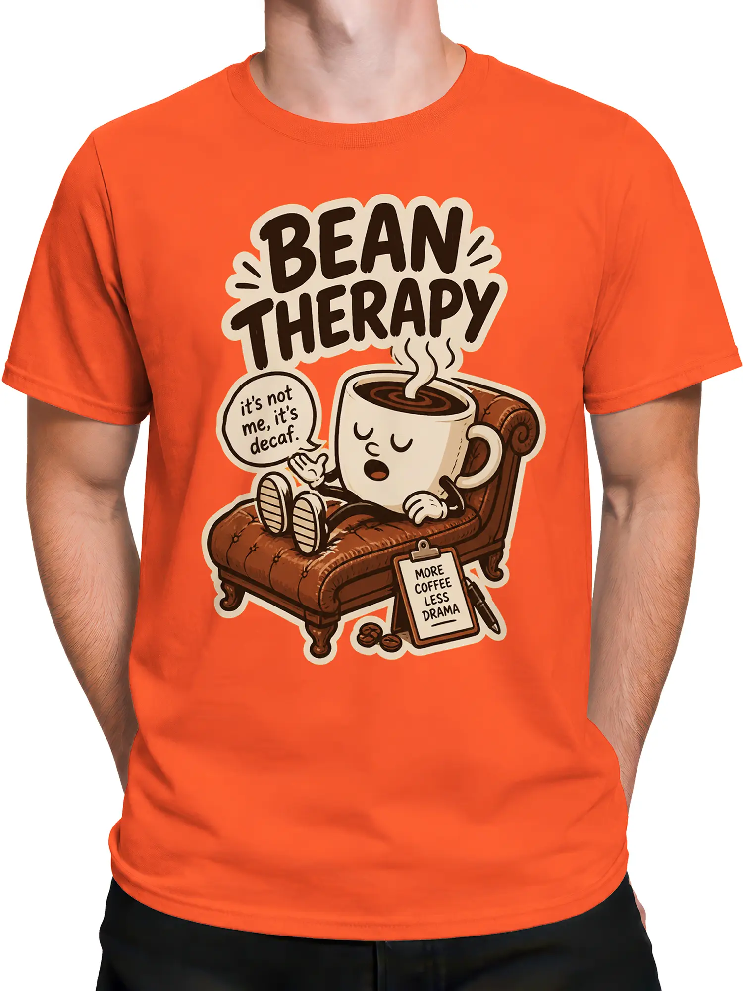 Male model wearing an orange Bean Therapy T-shirt with a coffee cup, chaise lounge, and decaf humor