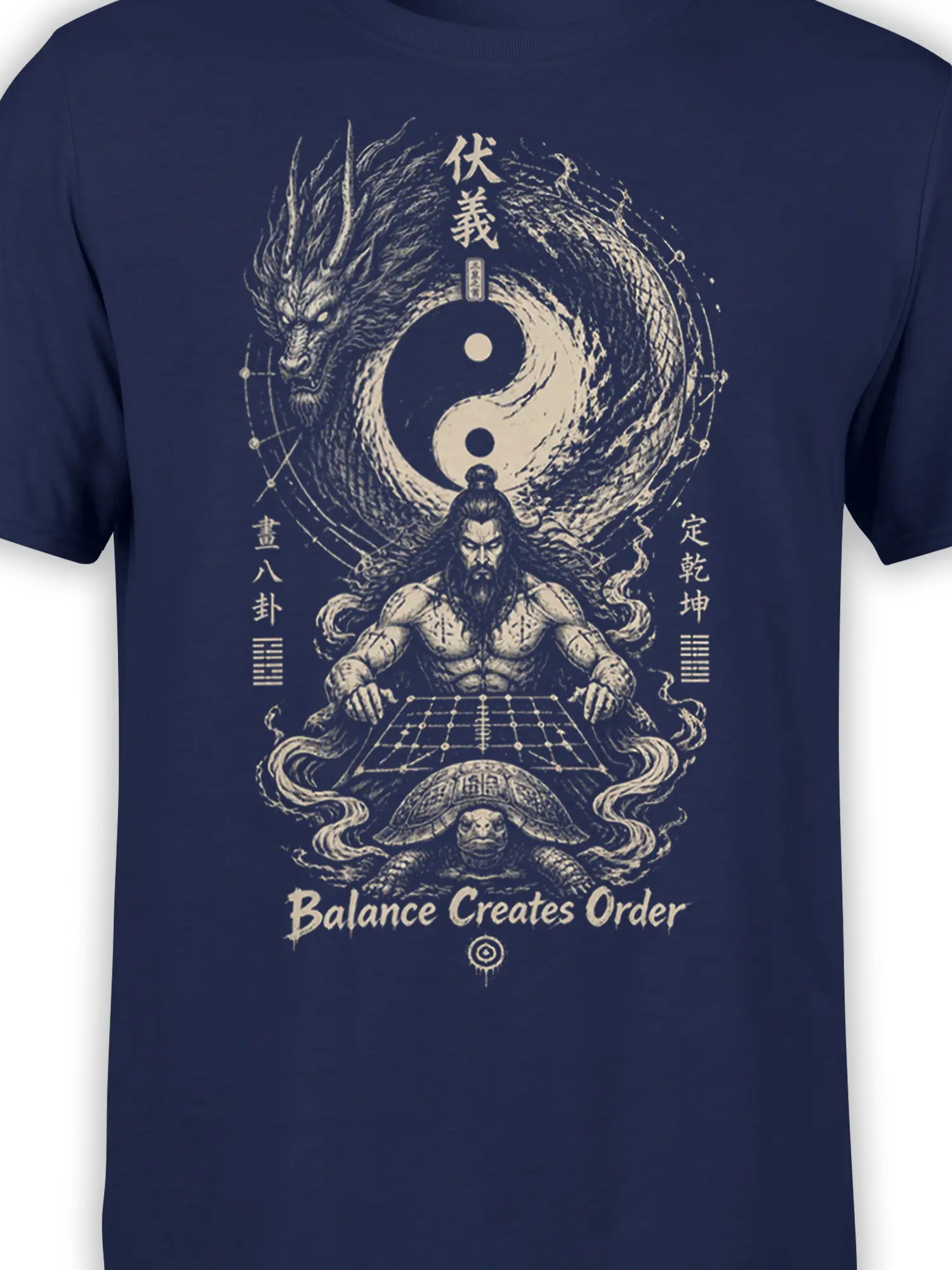 Close-up of navy dragon and yin yang T-shirt artwork with a seated bearded sage and turtle symbol