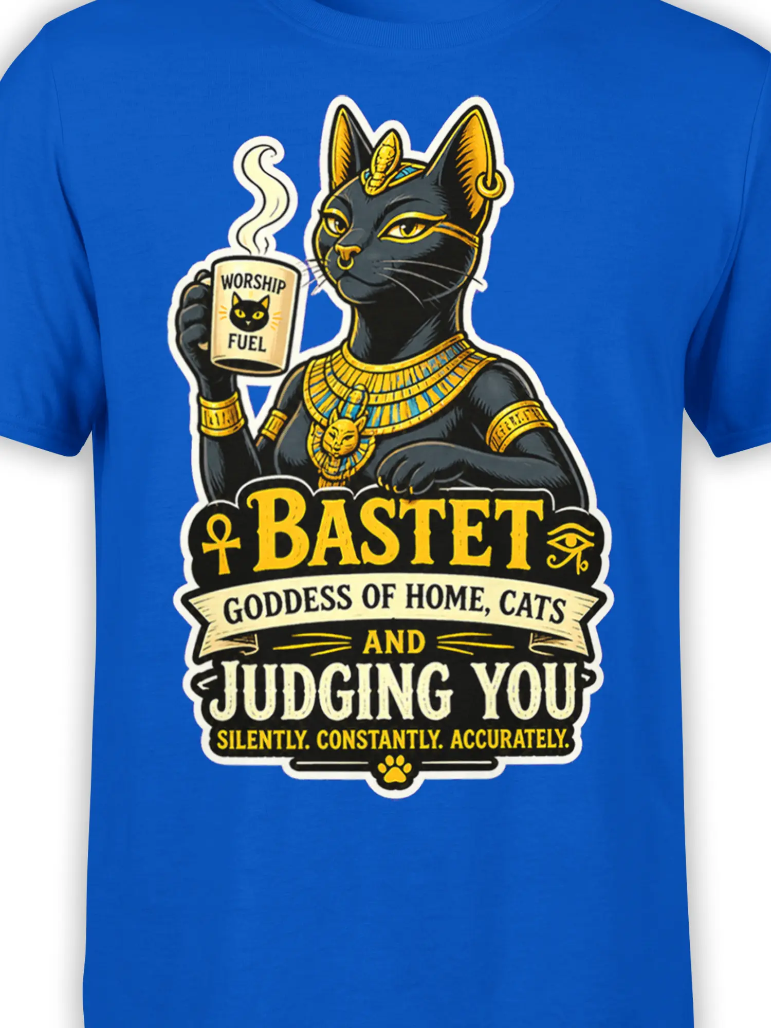 Close-up of Bastet cat artwork, Egyptian jewelry, coffee cup, and judgment lettering on a blue shirt