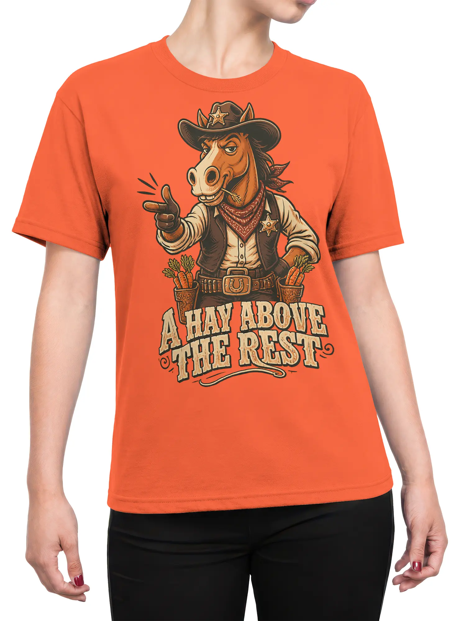 Female torso wearing an orange horse graphic tee with a cowboy sheriff horse and “A HAY ABOVE THE REST” design