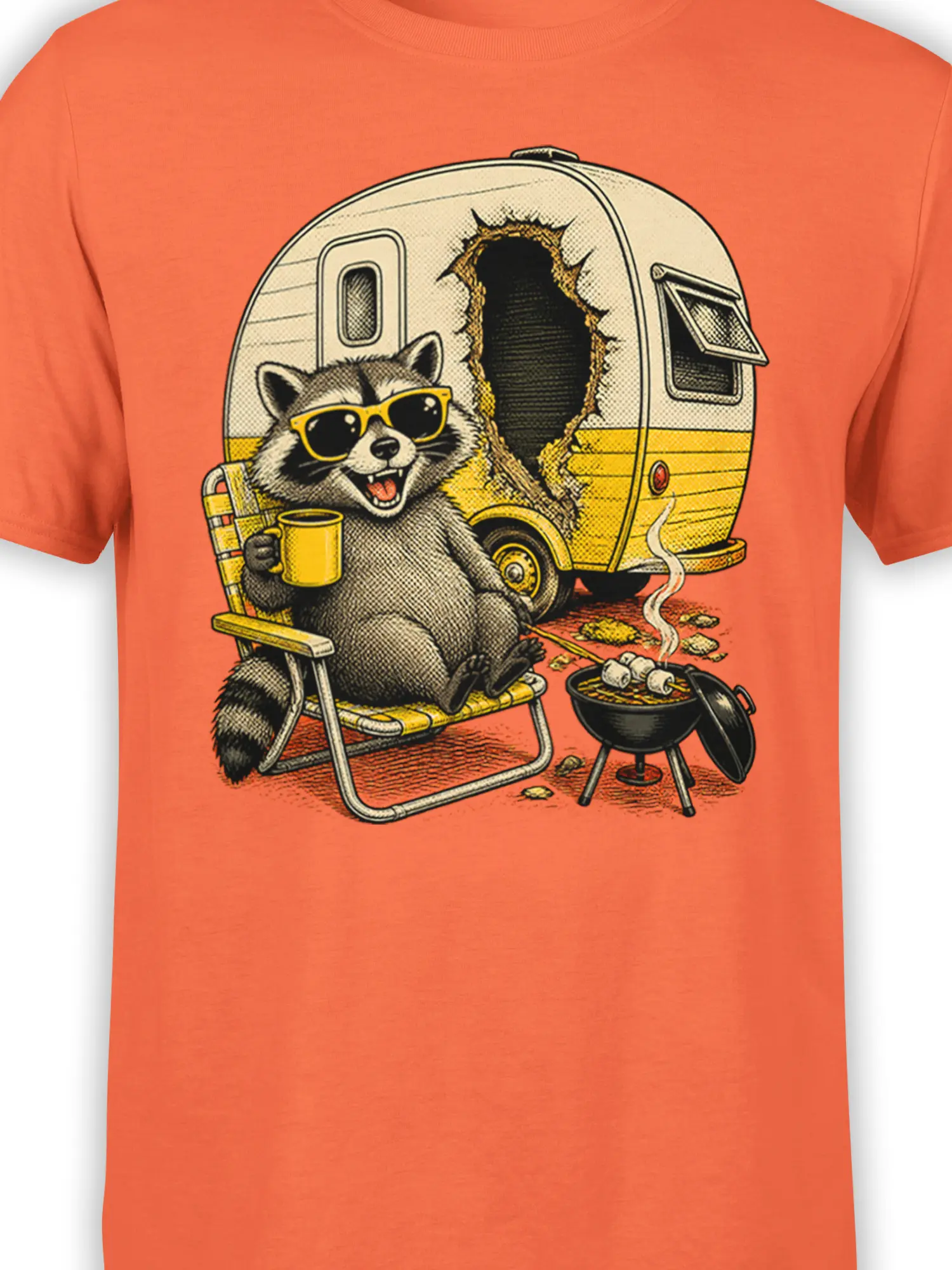 Close-up of the orange shirt graphic showing a sunglasses-wearing raccoon with coffee beside a camper and grill