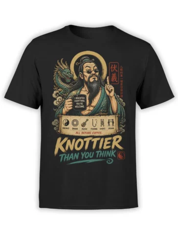 Black T-shirt with bearded inventor, green dragon, hobby symbols, and bold “KNOTTER THAN YOU THINK” lettering