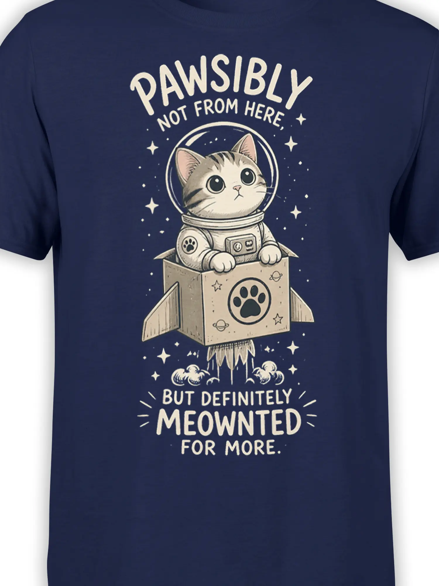 Close-up of astronaut cat, paw symbols, stars, and space lettering on a navy graphic tee