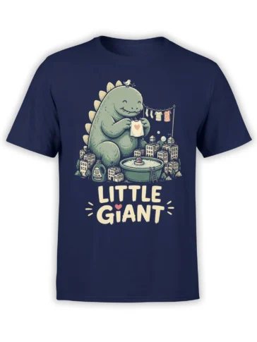 Little Giant dinosaur-like creature holding a heart shirt above a tiny city on a navy graphic tee