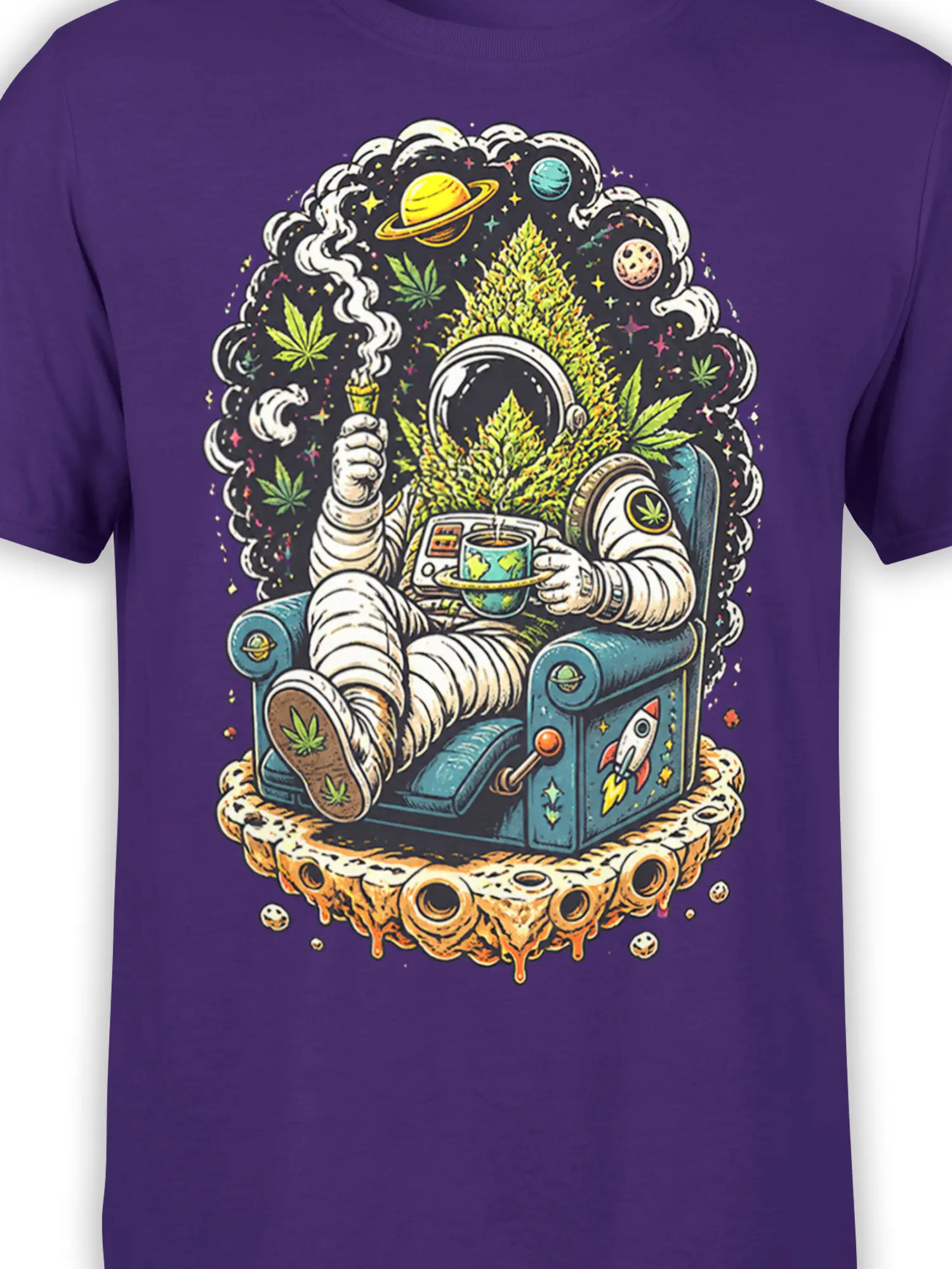 Close-up of cosmic astronaut artwork on a purple shirt with planets, smoke, leafy details, and a space chair