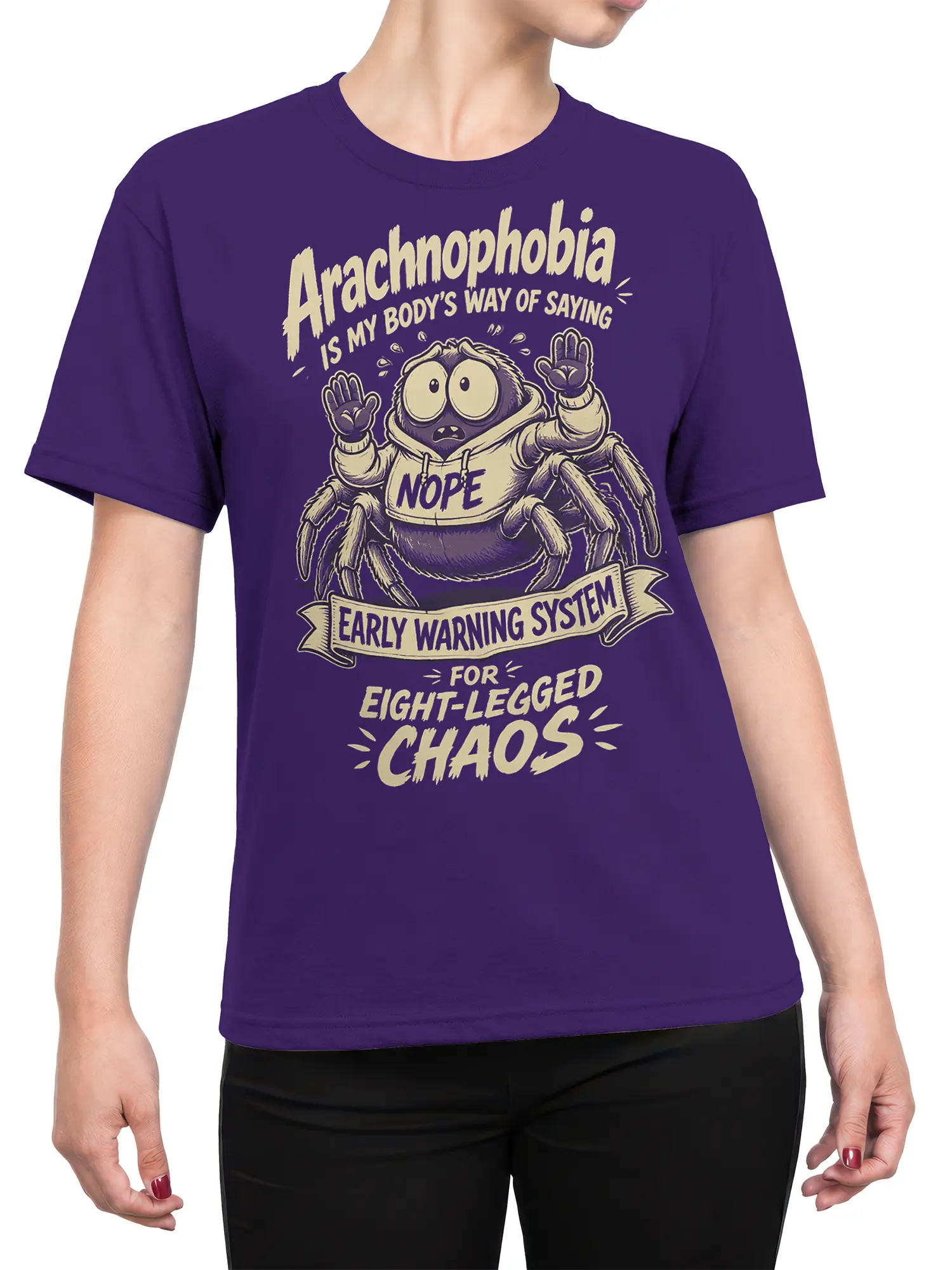 Female torso wearing a purple spider T-shirt with a cartoon arachnid and eight-legged chaos message