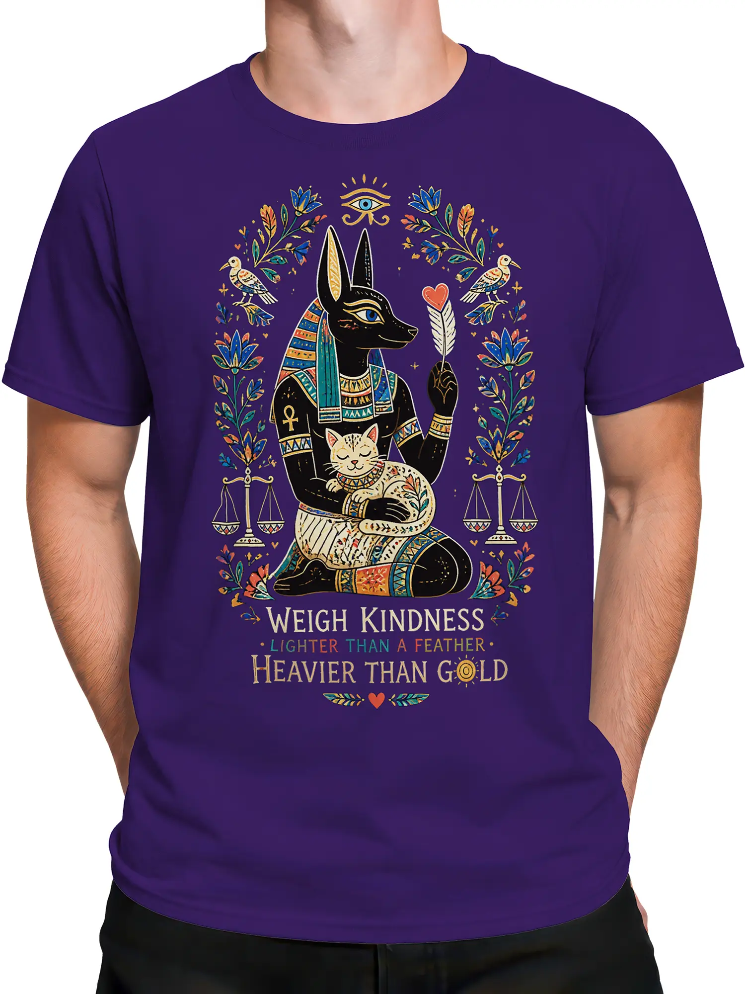 Male torso wearing a purple Egyptian graphic T-shirt with jackal figure, cat, feather, and sacred symbols