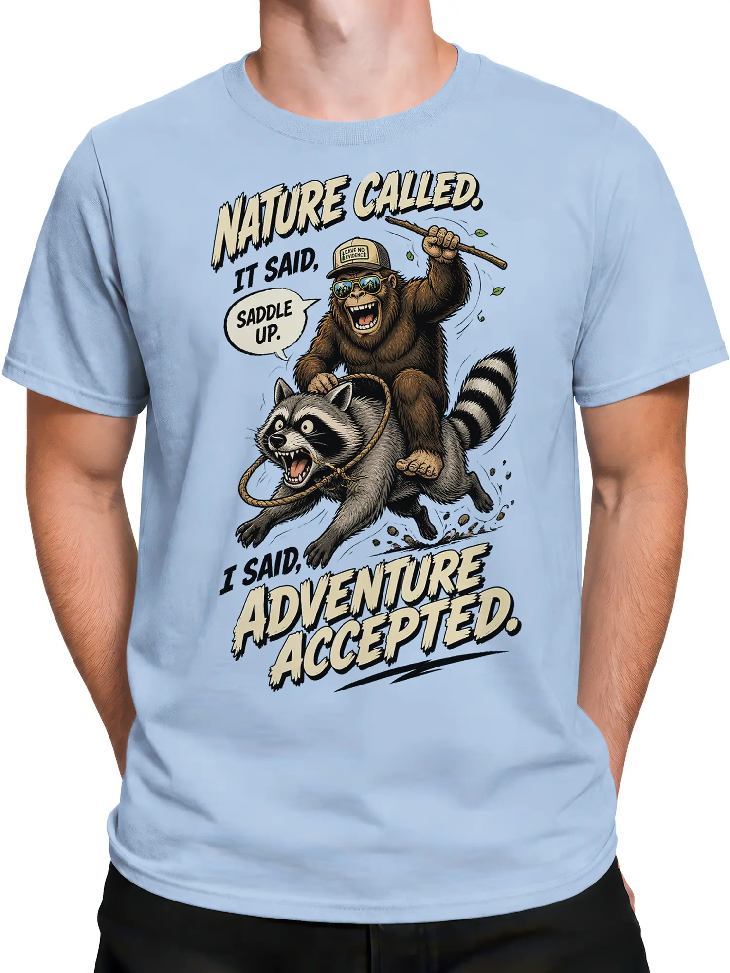 Male torso wearing a light blue T-shirt with a monkey riding a raccoon graphic