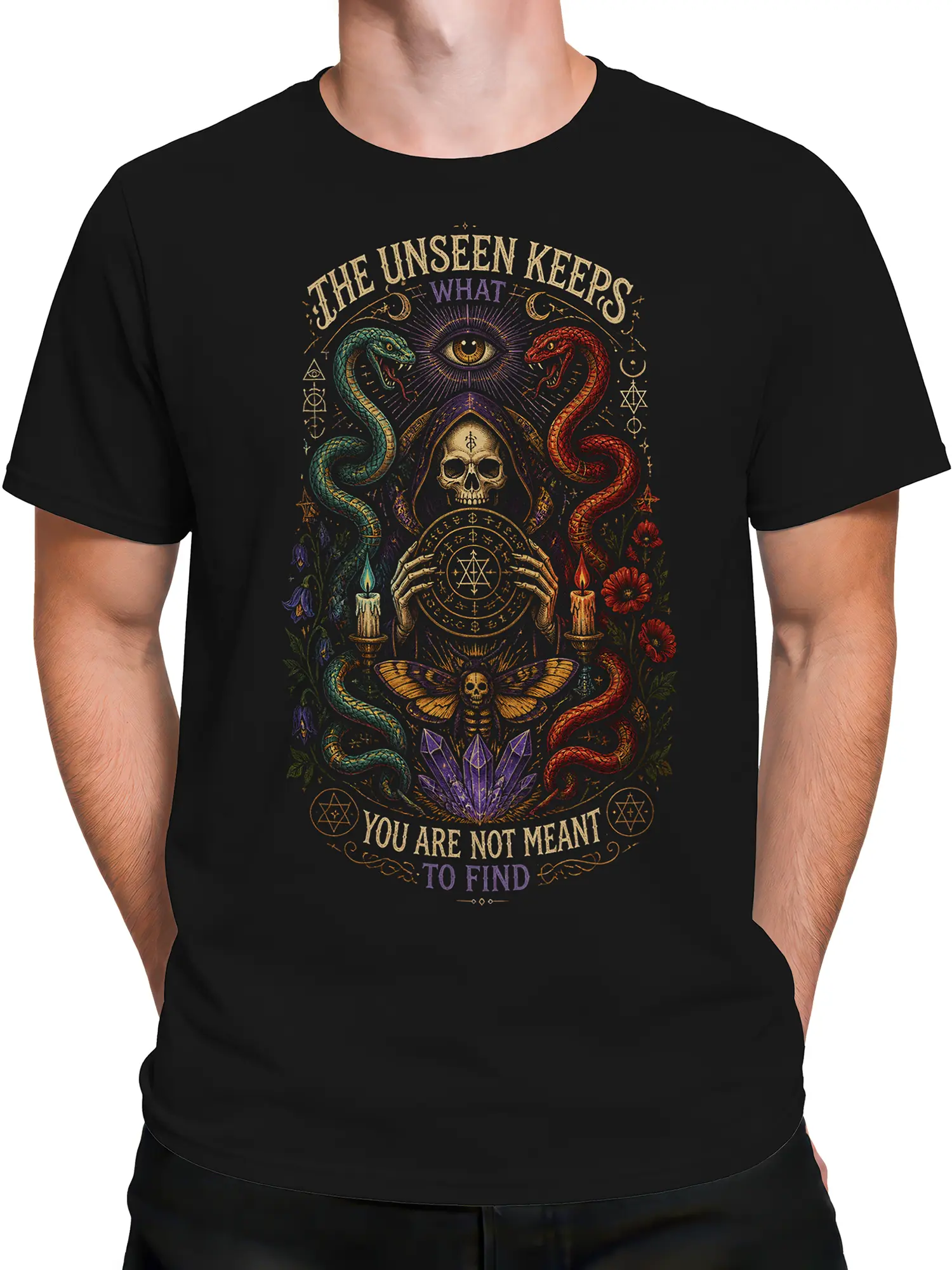 Male torso wearing a black occult T-shirt with twin snakes, skull, crystals, candles, and mysterious graphic artwork