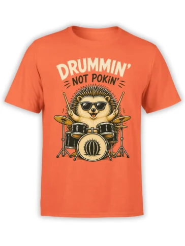 Coral T-shirt with a smiling hedgehog drummer in sunglasses and the words “Drummin’, Not Pokin’”