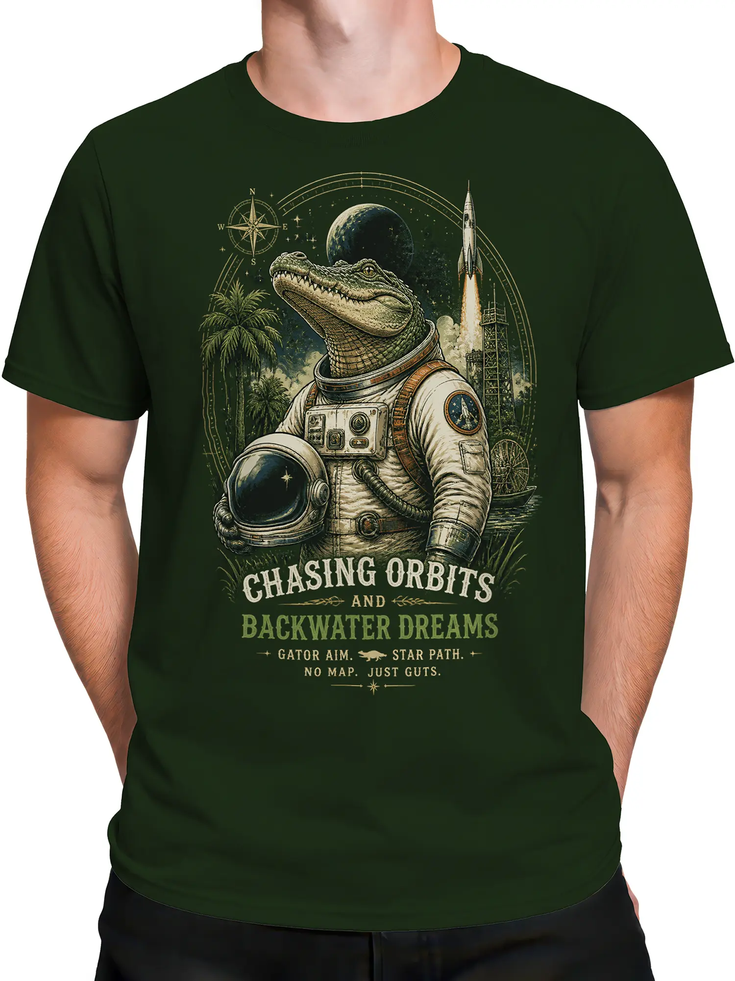 Male torso wearing a green T-shirt with a detailed alligator astronaut and retro rocket space graphic