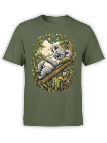 Green T-shirt featuring a sleeping gray koala on a leafy branch with books, tea, blanket, and basket