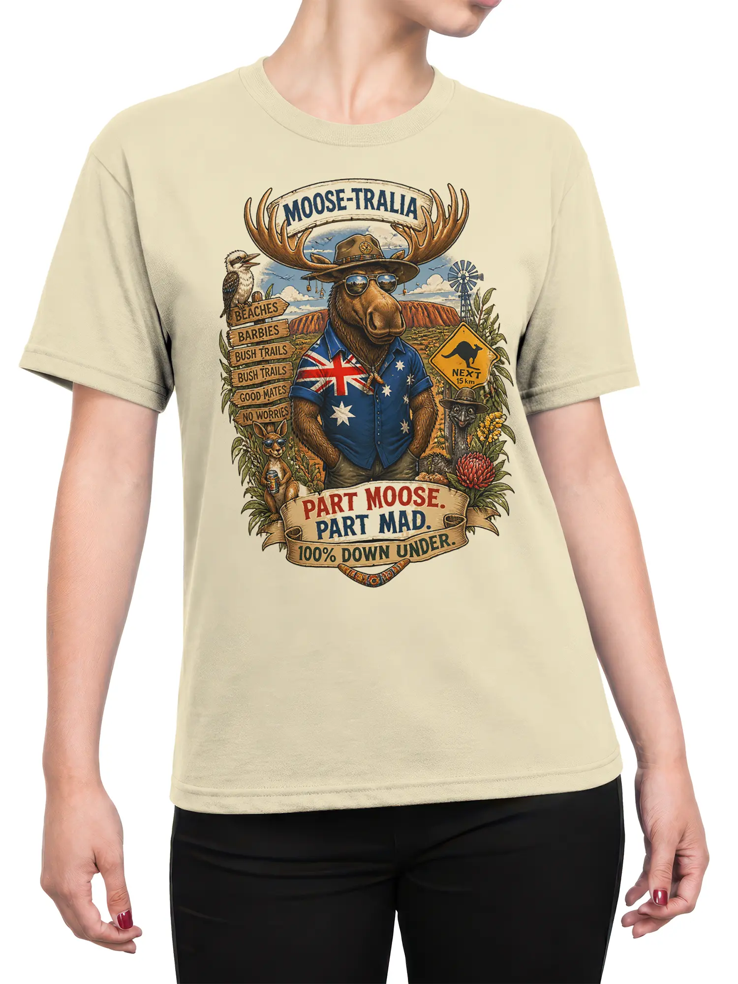 Female torso wearing a beige Australian moose graphic T-shirt with a colorful vintage outback illustration