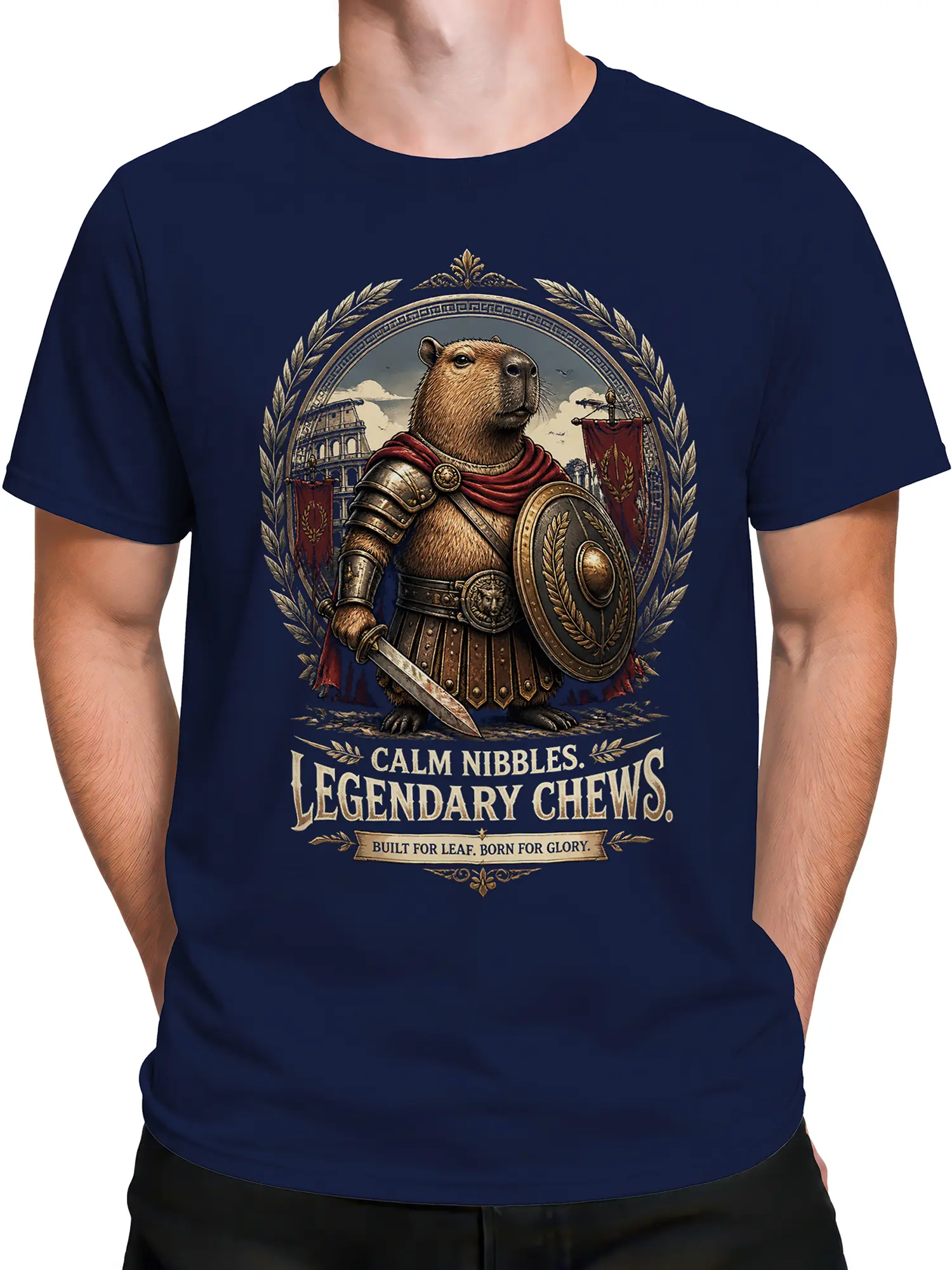 Male torso wearing a navy T-shirt with armored capybara, Roman symbols, and legendary chews lettering