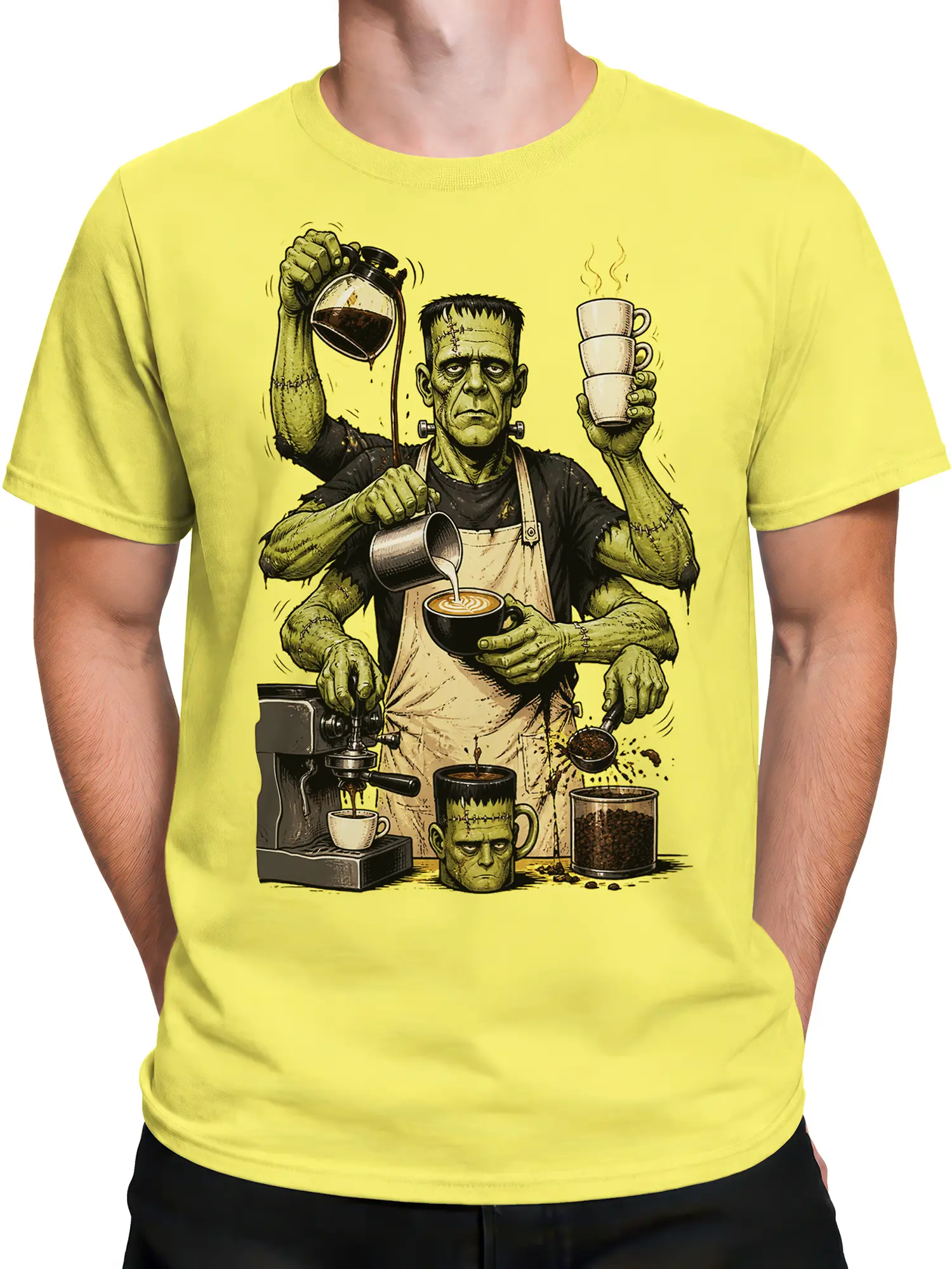 Male torso wearing a yellow T-shirt with stitched green barista coffee artwork and espresso equipment