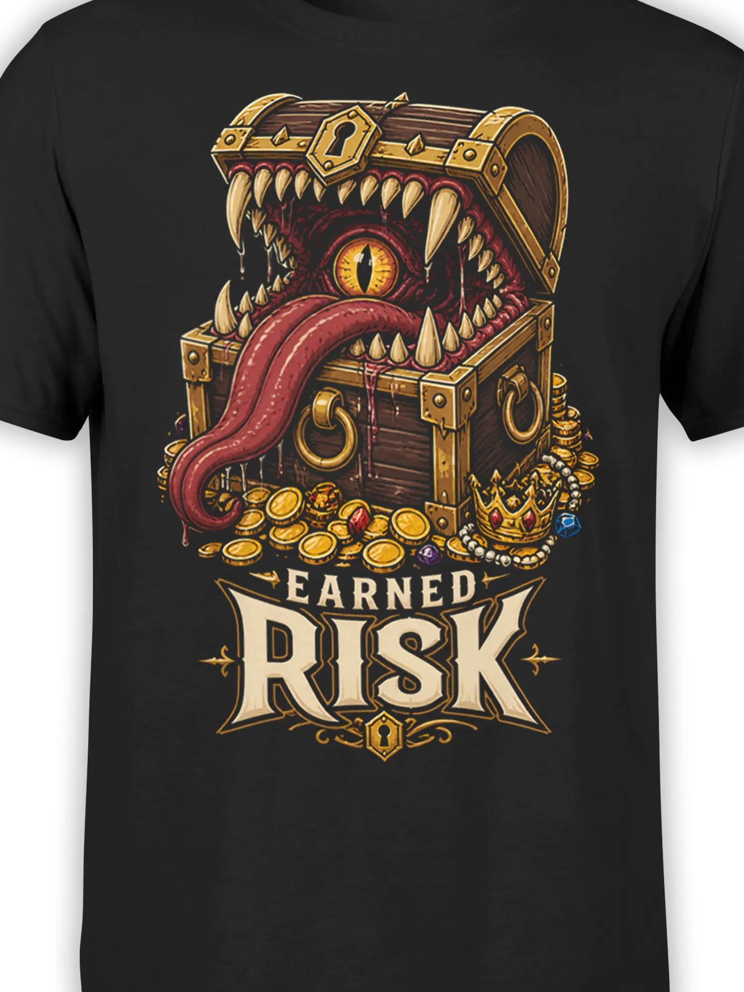 Close-up of the black T-shirt design showing the treasure chest monster’s eye, teeth, tongue, lock, and gold details