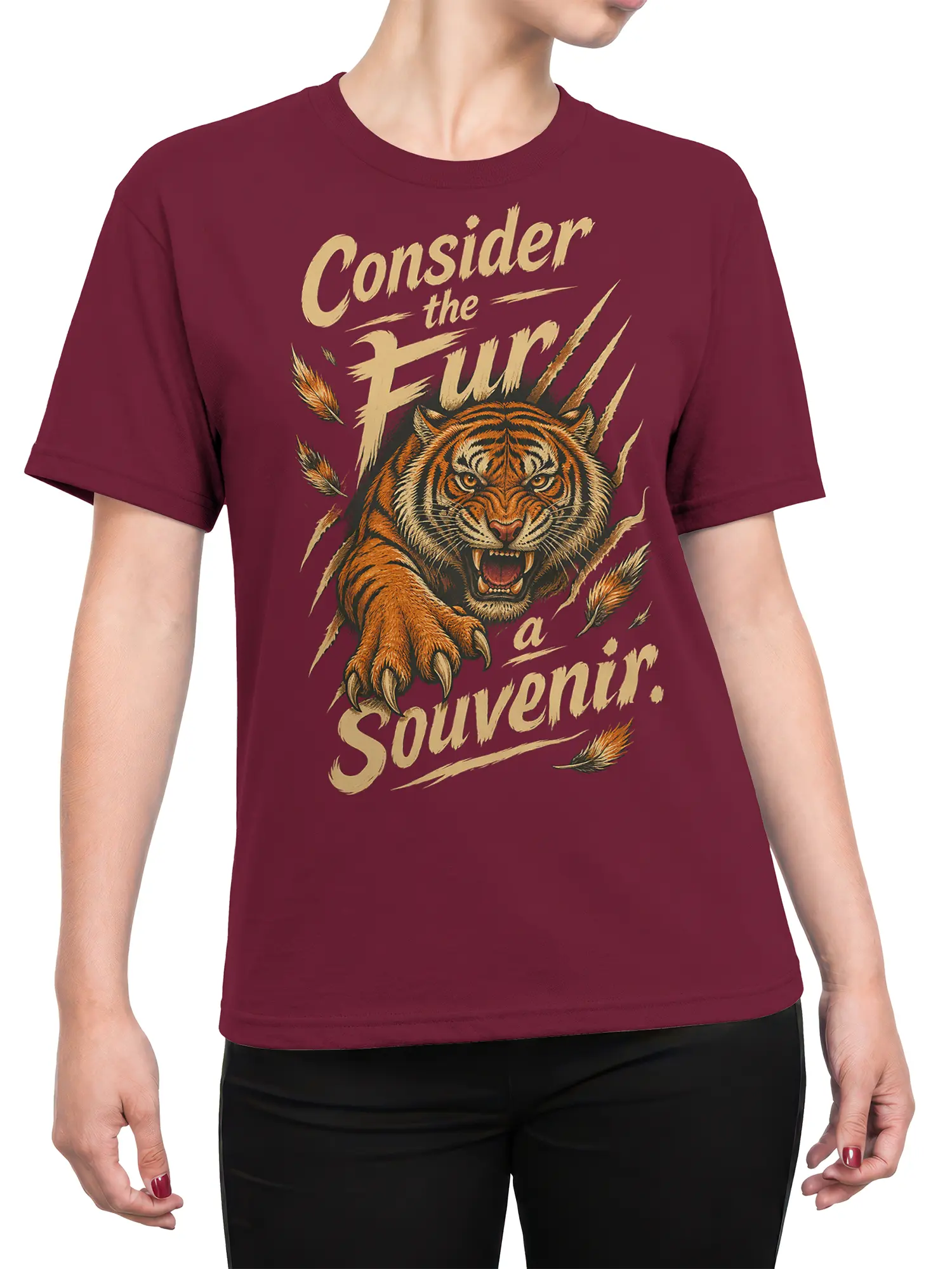 Female torso wearing a burgundy T-shirt with a roaring tiger and vintage cream “Consider the Fury” graphic