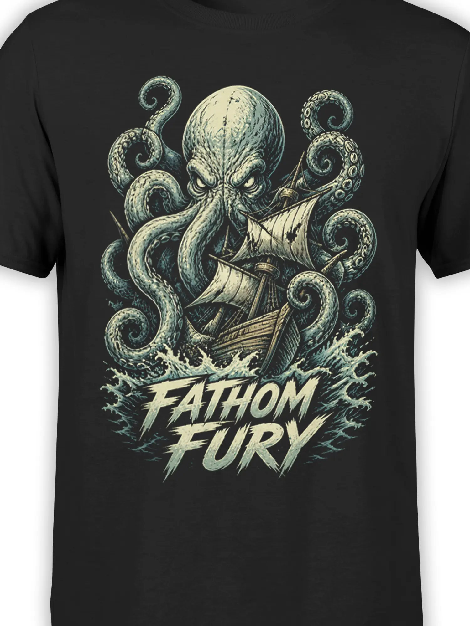 Close-up of kraken tentacles, sailing ship, crashing waves, and FATHOM FURY artwork on a black T-shirt