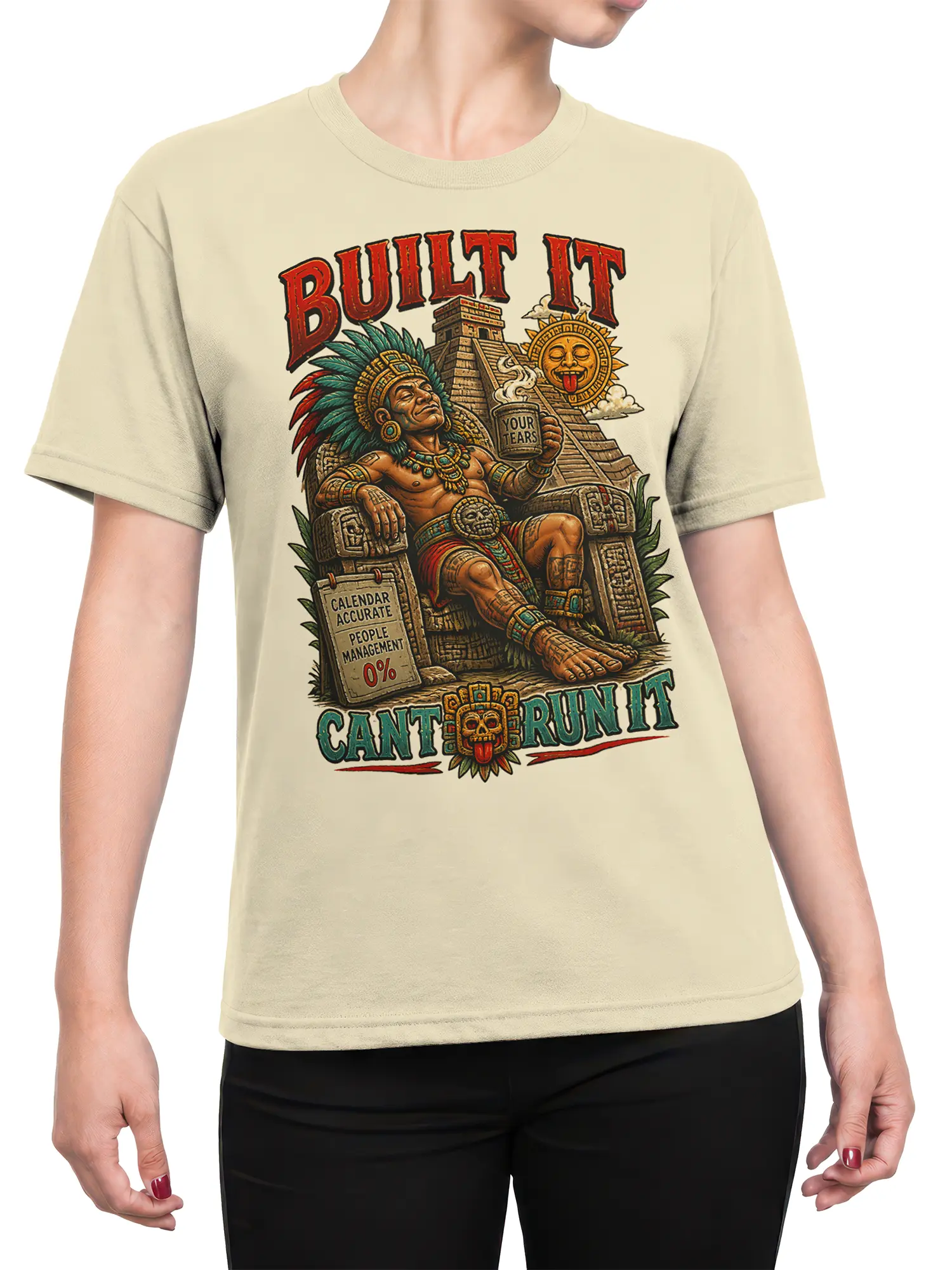 Female torso wearing beige T-shirt with ancient ruler temple artwork and sarcastic boss design