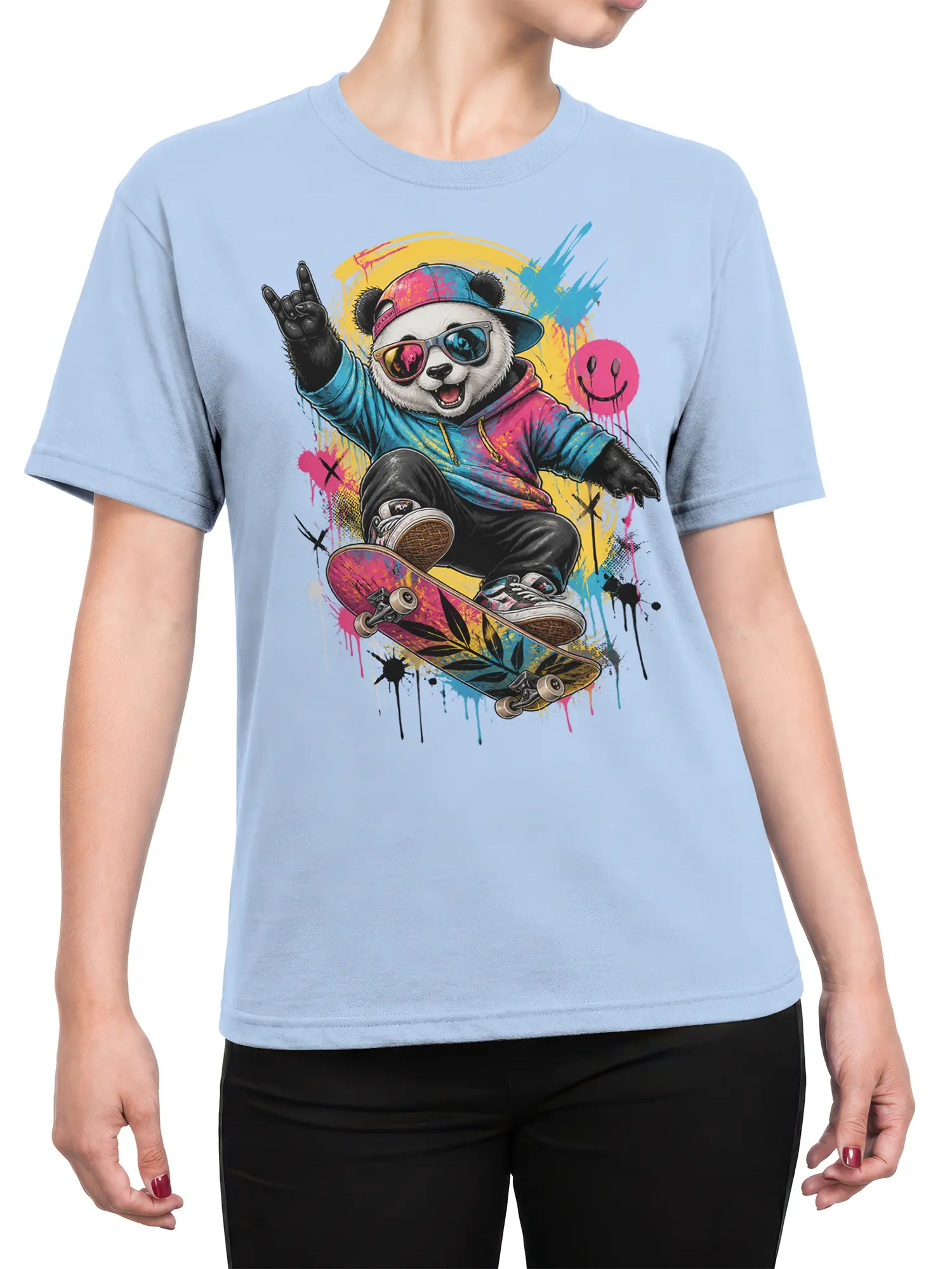 Female torso wearing a light blue panda skateboard shirt with colorful graffiti artwork and a playful streetwear design