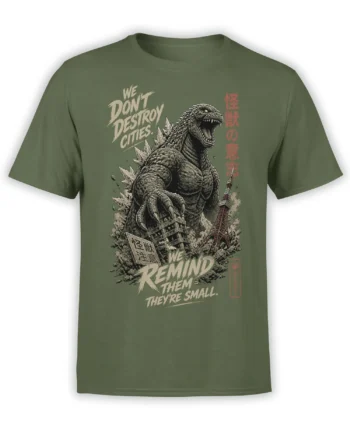 Olive green T-shirt with a roaring giant monster above damaged buildings and bold cream and red lettering