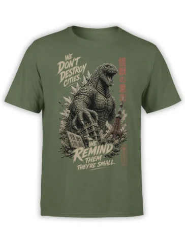Olive green T-shirt with a roaring giant monster above damaged buildings and bold cream and red lettering