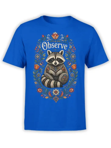 Blue raccoon T-shirt with “Observe” text and a colorful folk floral frame around the animal