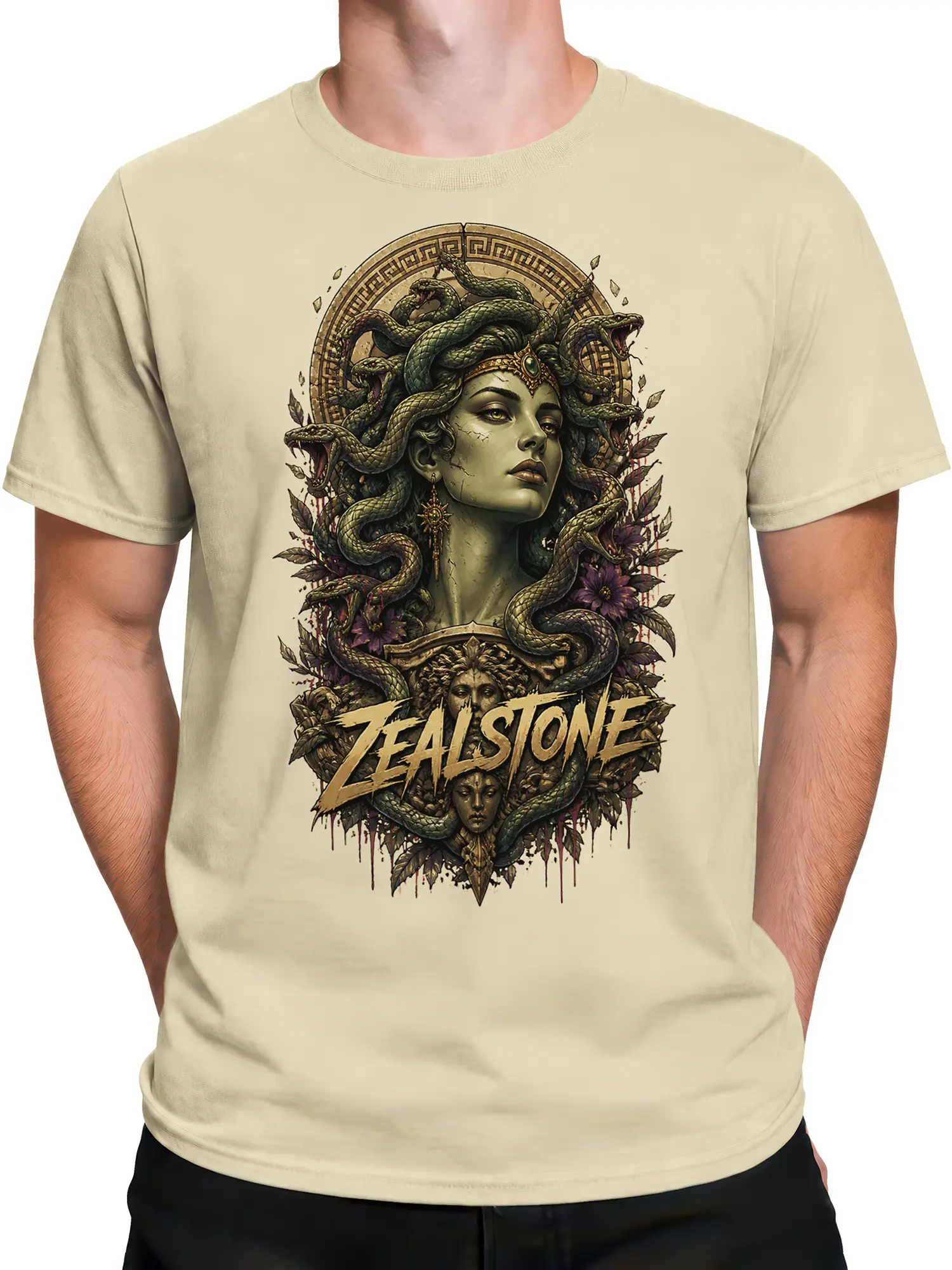 Male torso wearing a beige fantasy graphic tee with a serpent-haired woman and curling snakes