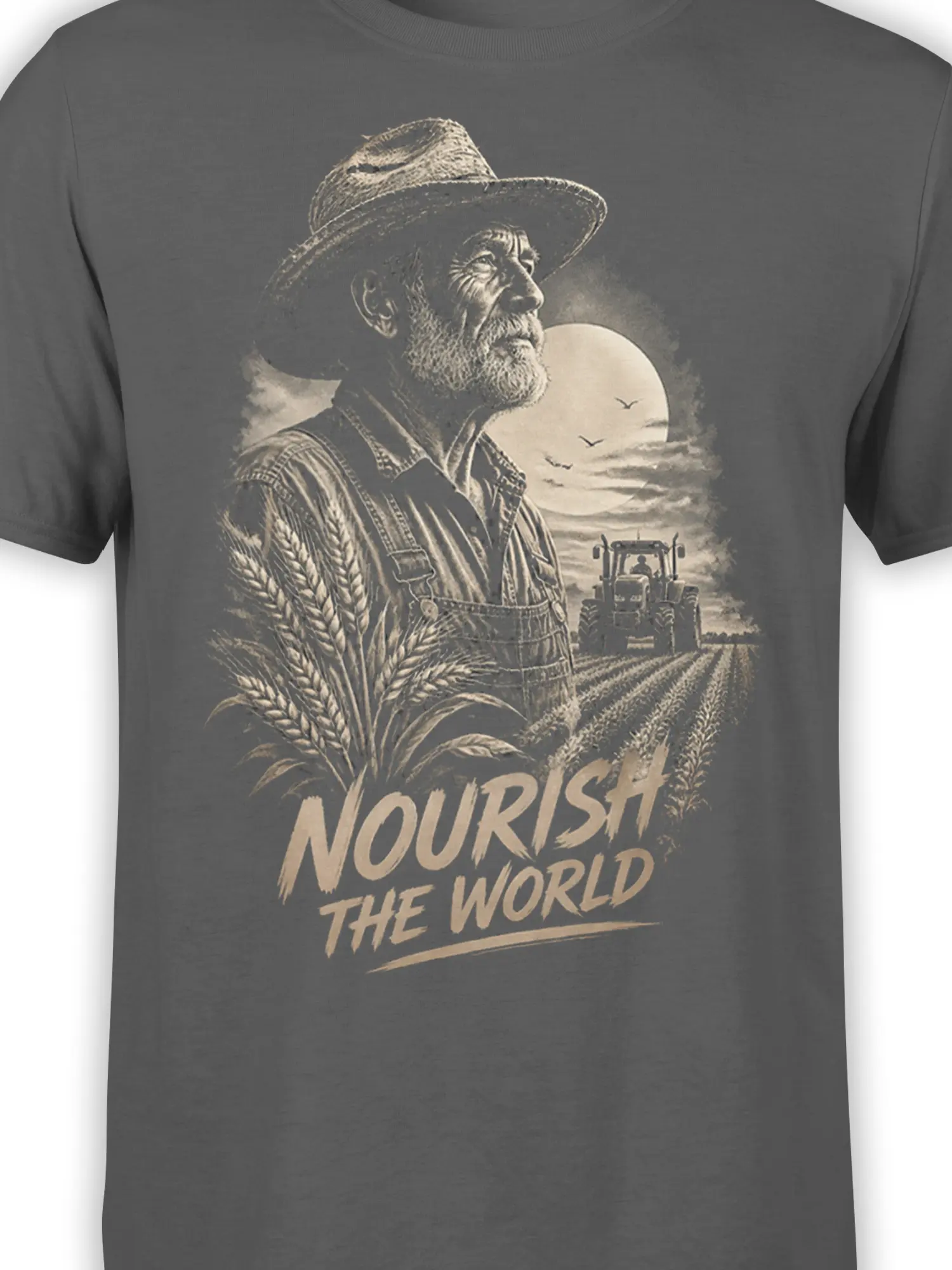 Close-up of gray farmer graphic tee showing wheat, tractor, moon, birds, and “Nourish the World” text