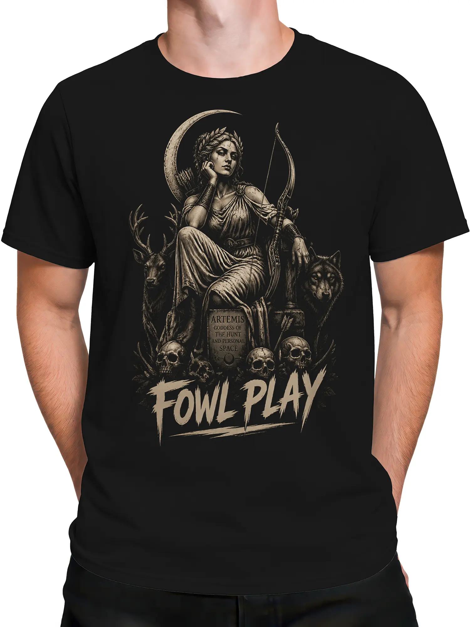 Male torso wearing a black Artemis goddess T-shirt with crescent moon, bow, deer, wolf, skulls, and Fowl Play design