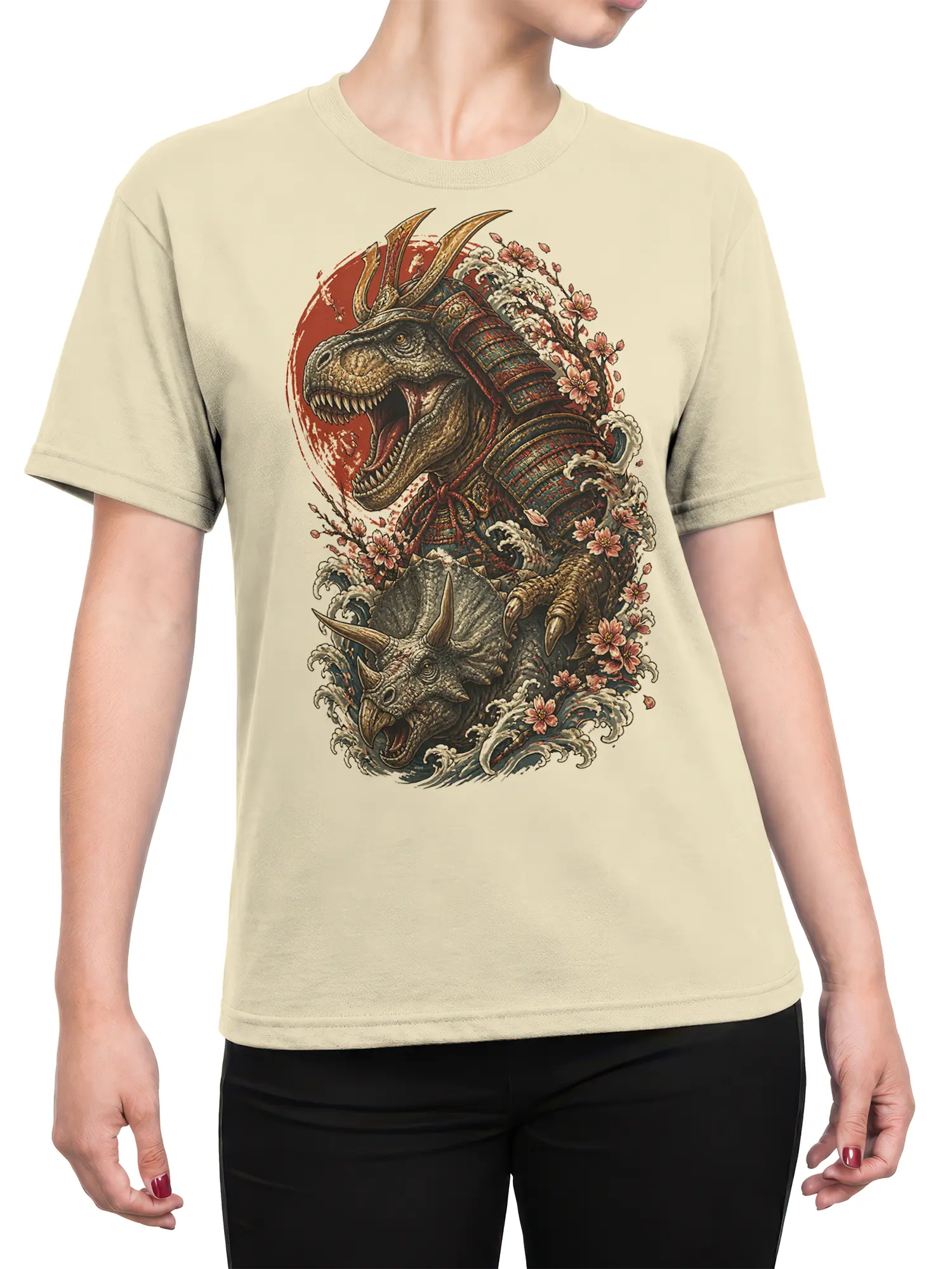 Female torso wearing a beige T-shirt with armored dinosaurs, ocean waves, and cherry blossom artwork