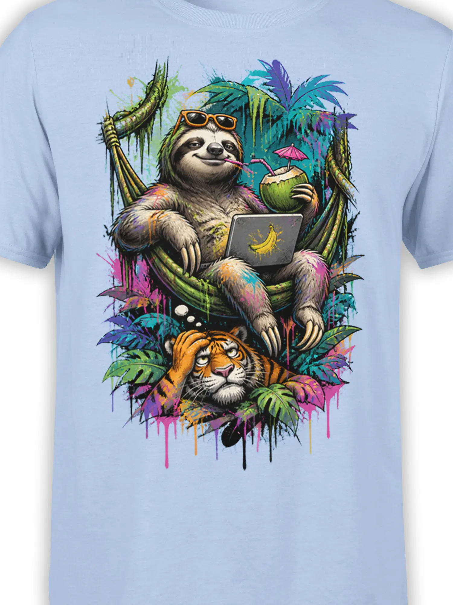 Close-up of the sloth, coconut drink, laptop, and tiger tropical artwork on a light blue T-shirt