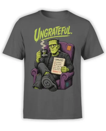 Gray graphic tee with a stitched green monster, complaint notebook, steaming mug, and “UNGRATEFUL” text