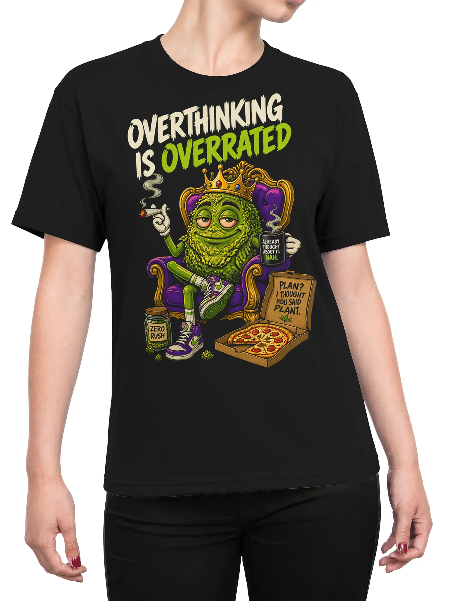 Female torso wearing a black shirt with a crowned green monster and Overthinking Is Overrated artwork