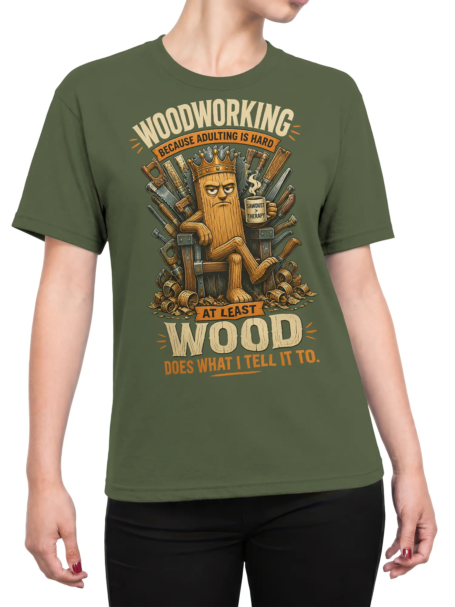 Female torso wearing a green woodworking shirt with a crowned wooden character and humorous sawdust lettering