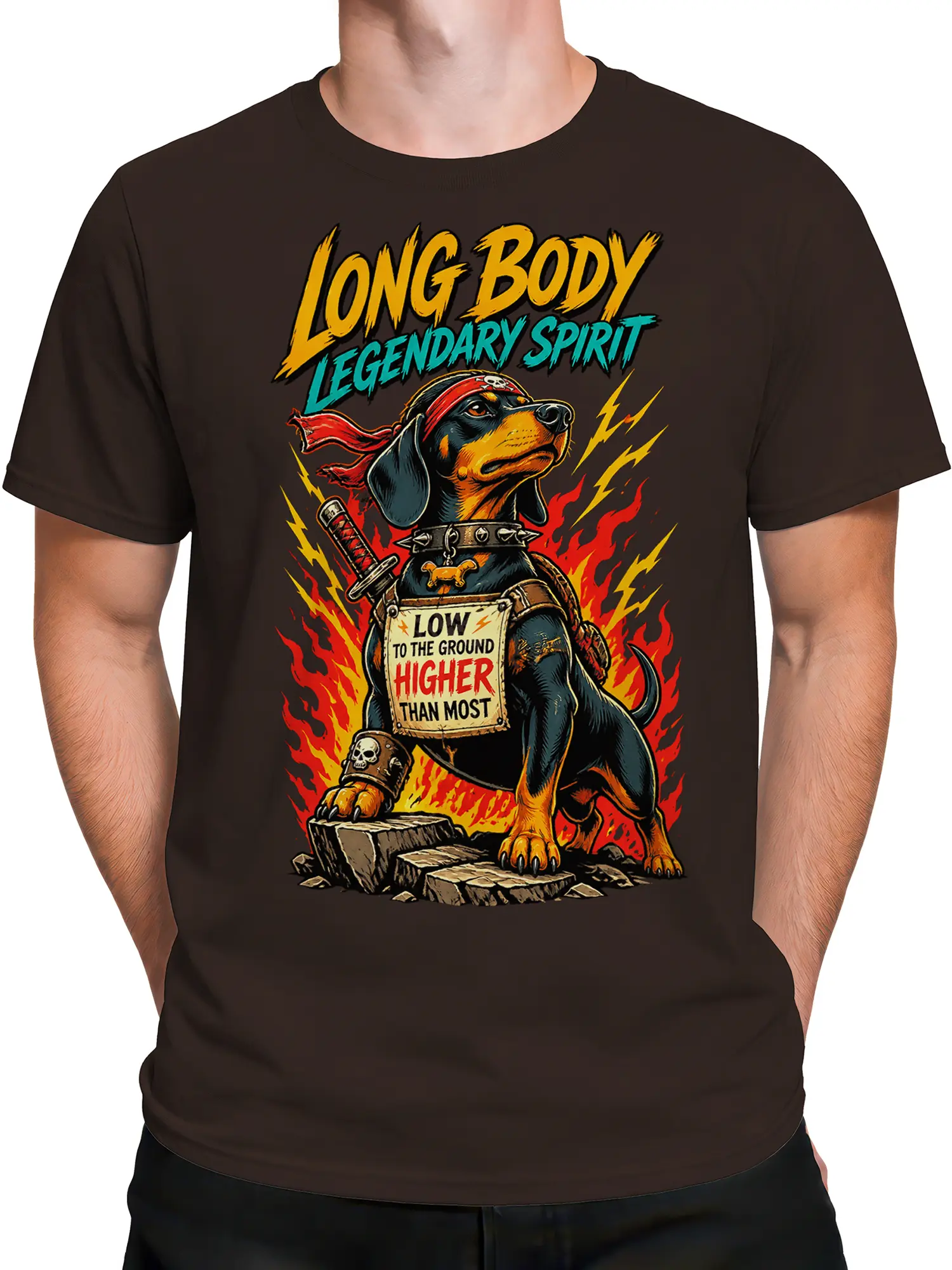 Male torso wearing a brown dog warrior T-shirt with red bandana, sword, flames, lightning, and retro text