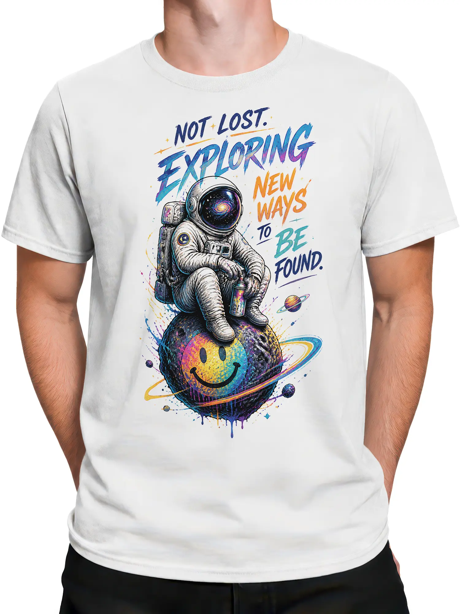 Male torso wearing a white space explorer T-shirt with a colorful astronaut and ringed planet graphic