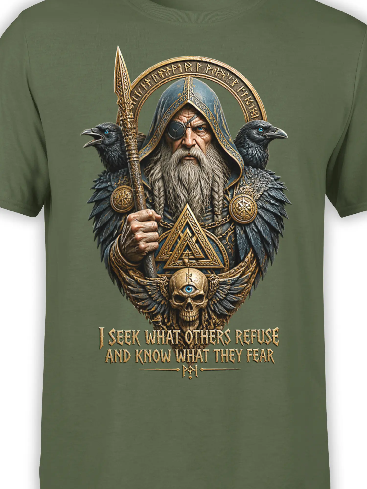 Close-up of one-eyed Norse seer and ravens on an olive green fantasy graphic T-shirt