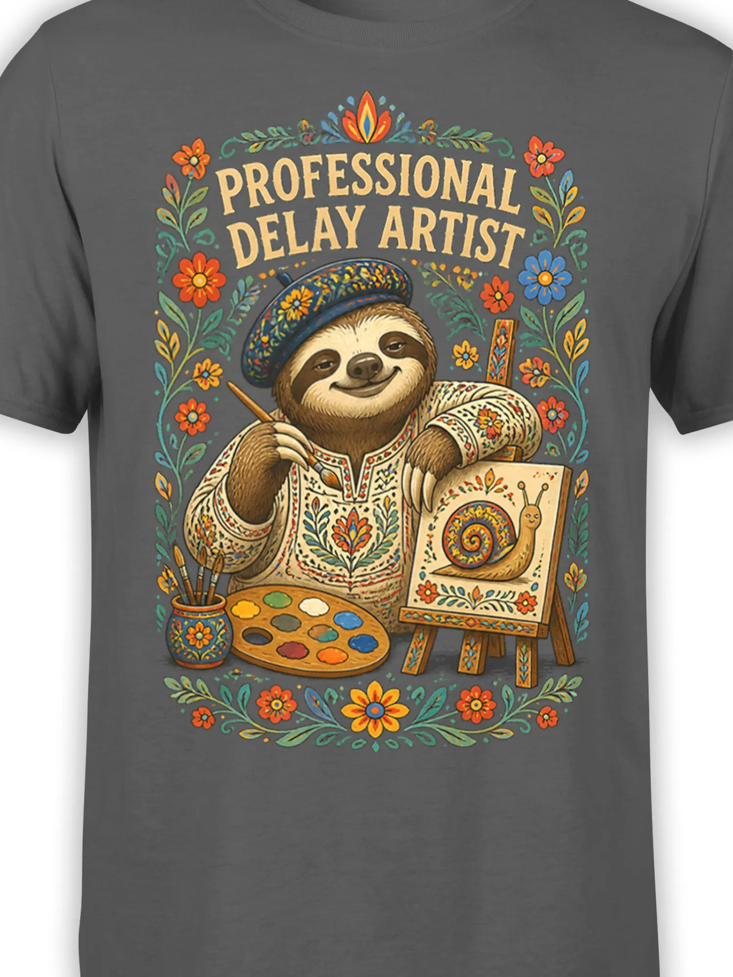 Close-up of colorful sloth artist graphic with paintbrush, palette, snail artwork, flowers, and text on gray fabric