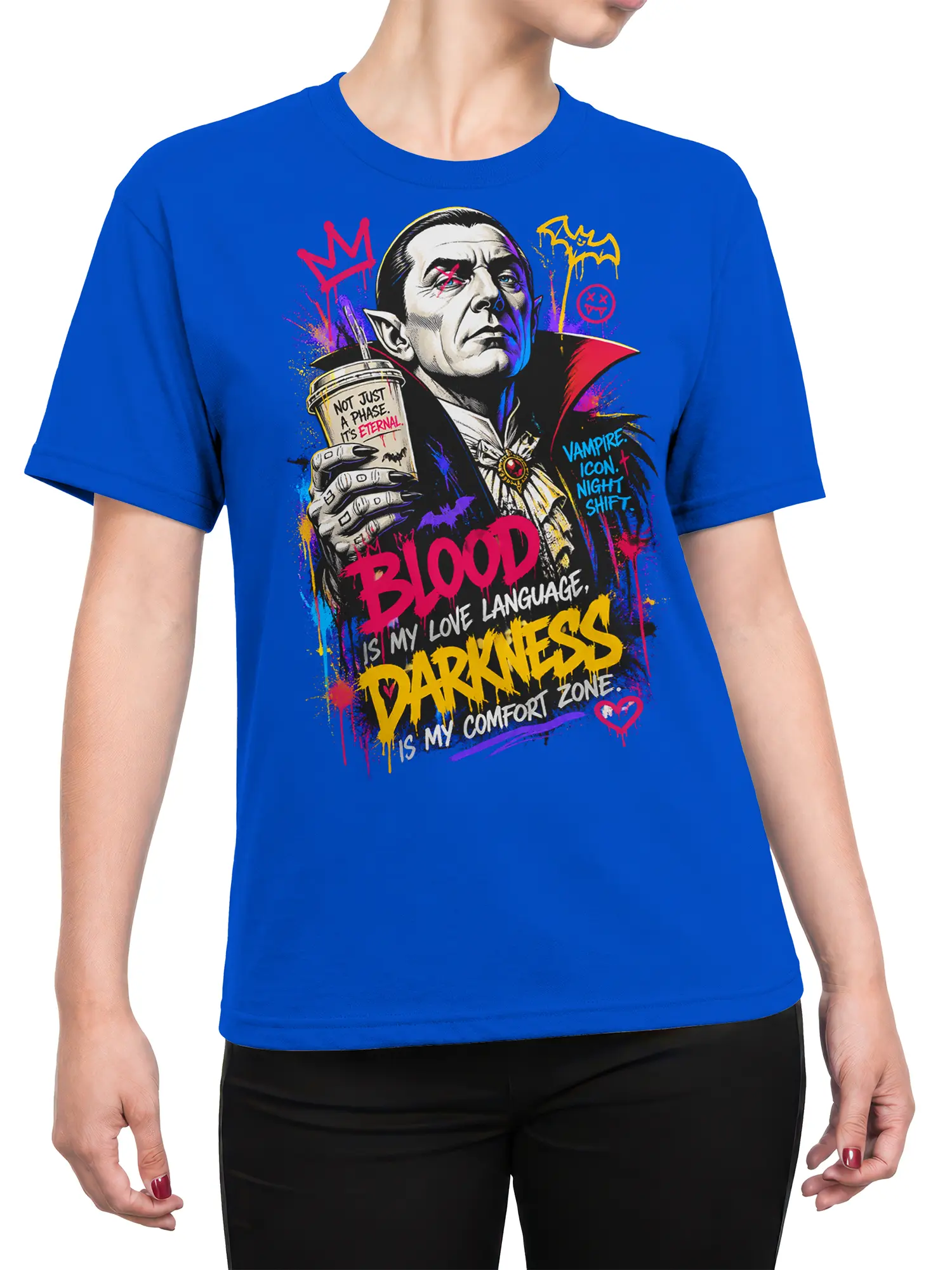 Female torso wearing a blue vampire graphic T-shirt with colorful gothic artwork and bold lettering