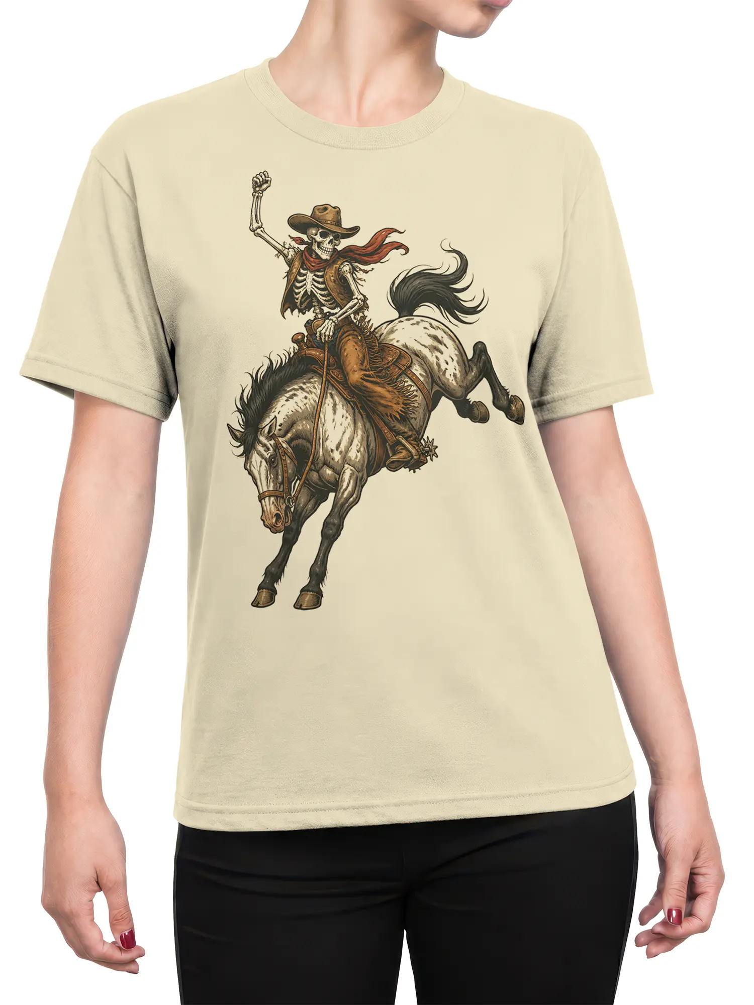 Female torso wearing a beige T-shirt with skeleton cowboy riding horse artwork