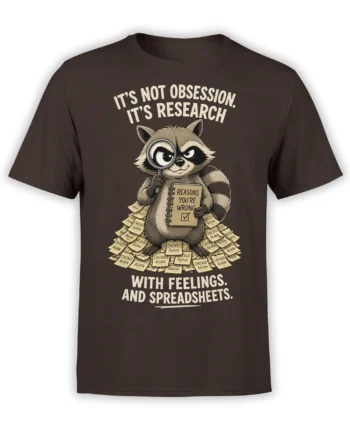 Brown raccoon research T-shirt with magnifying glass, notebook, checked-again notes, and spreadsheet humor